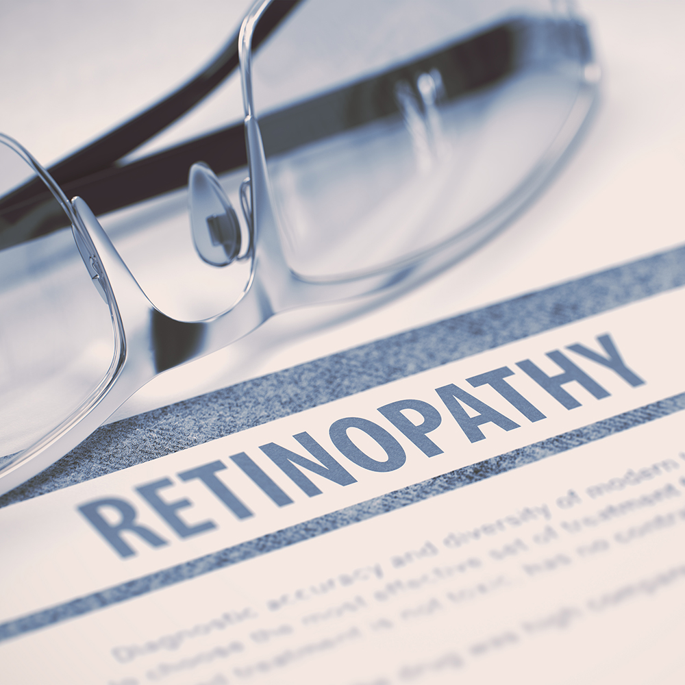 Retinopathy - Printed Diagnosis with Blurred Text on Blue Background with Glasses. Medical Concept. 3D Rendering.